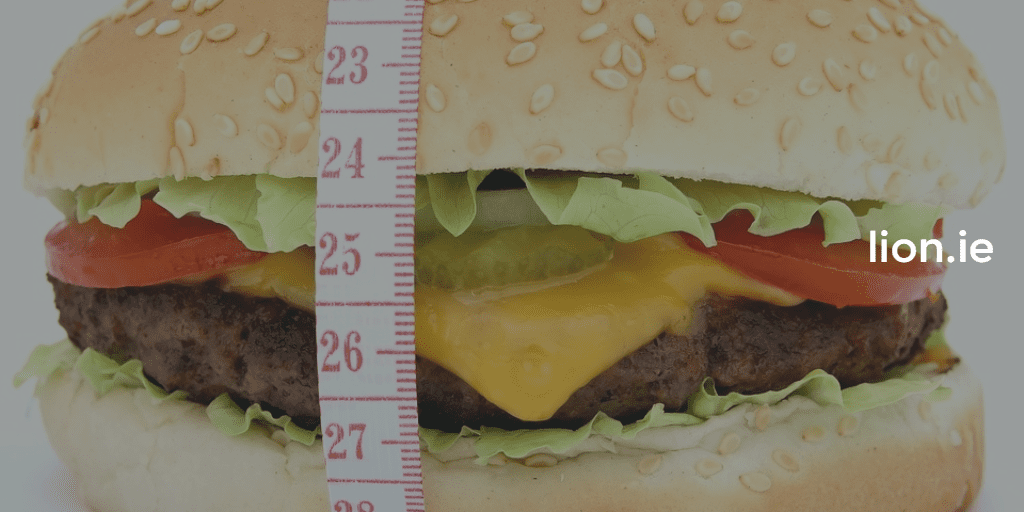 cheeseburger with measuring tape